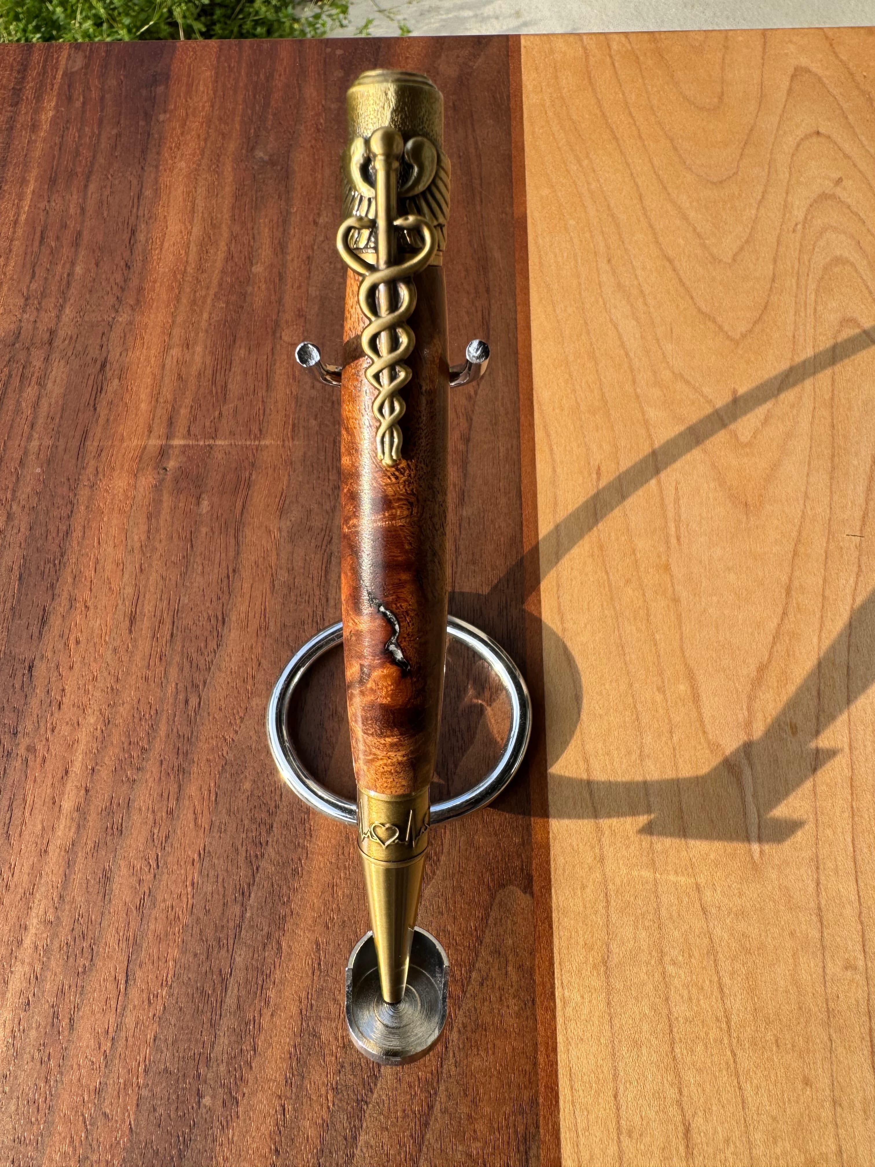 caduceus pen · burl, brass